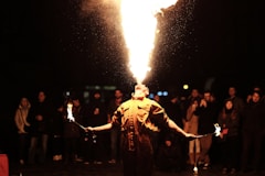 person breathing fire