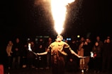 person breathing fire