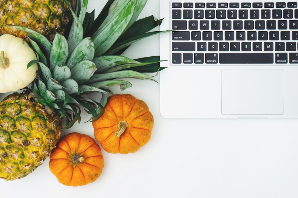 two orange pumpkins