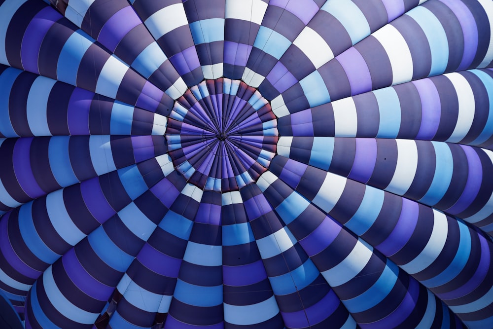 purple, sky-blue, white, and black stripe textile