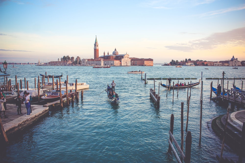 photography of of people near boat during daytime