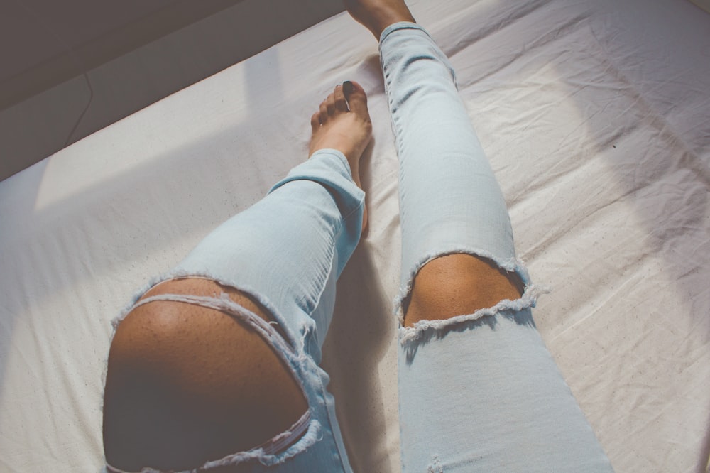 women's distressed blue denim jeans