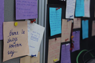 A colorful bulletin board filled with uplifting scripture verses.
