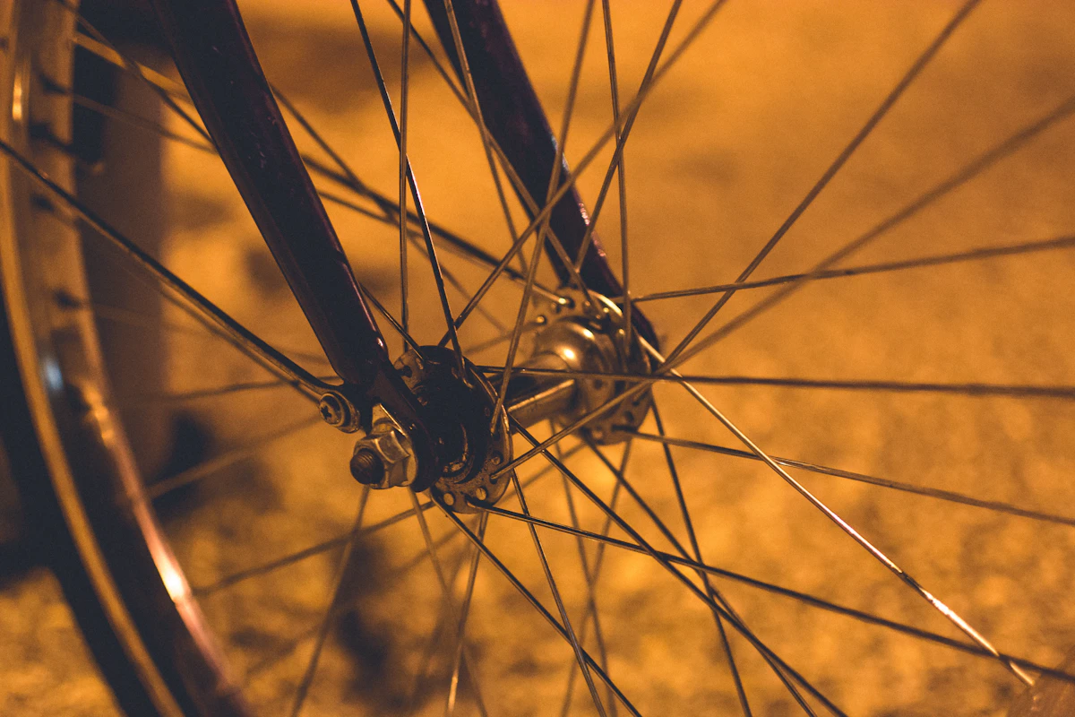 A hand-built wheel mid-lace, spokes still loose.