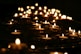 low-angle photo of lightened candles
