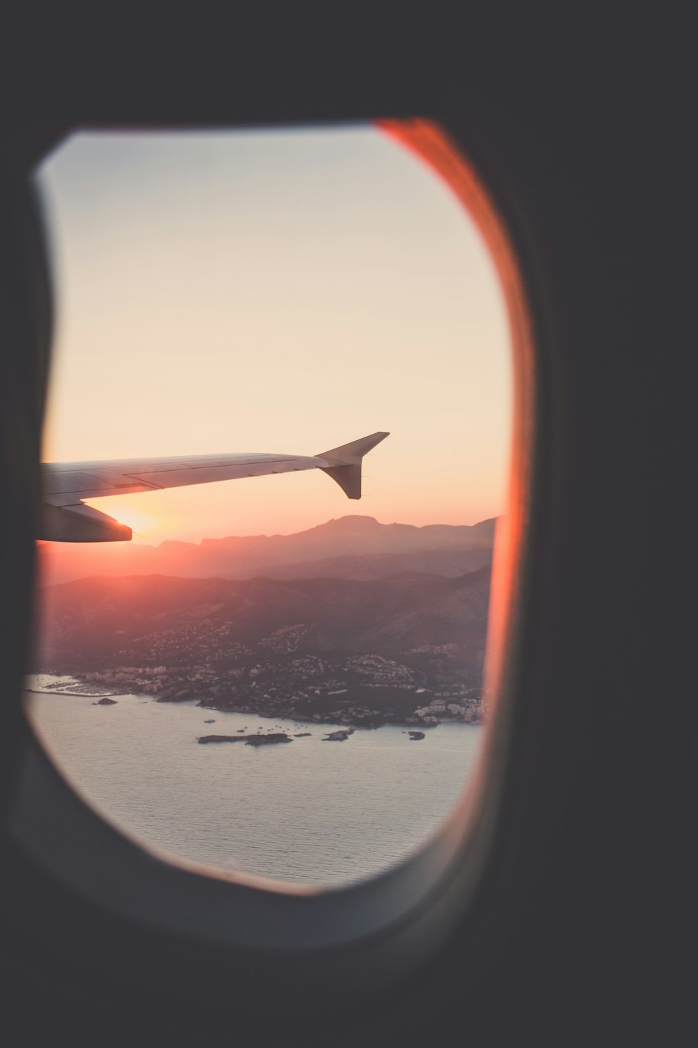 person riding airplane photography