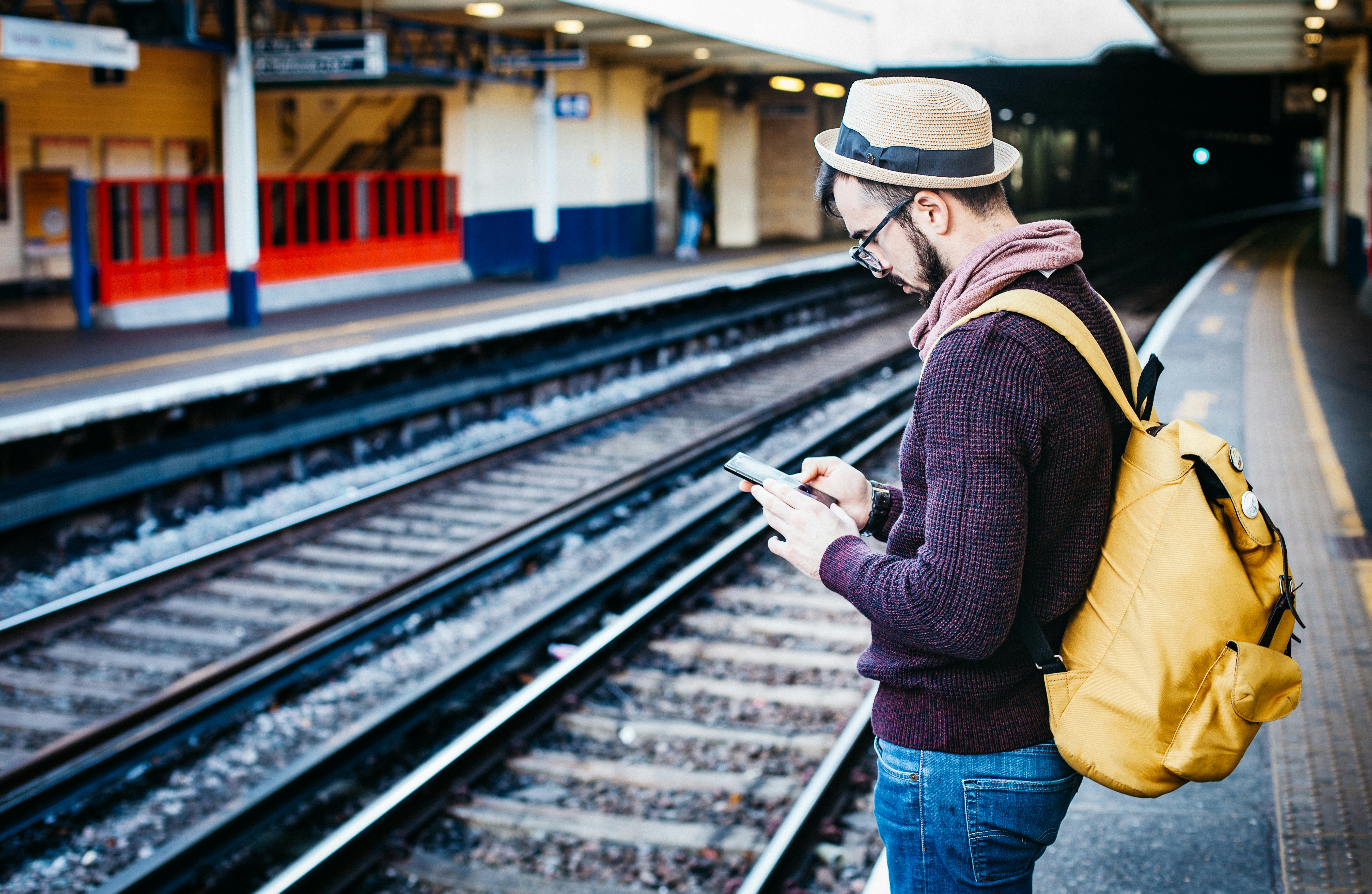 Backpacker waiting for the train