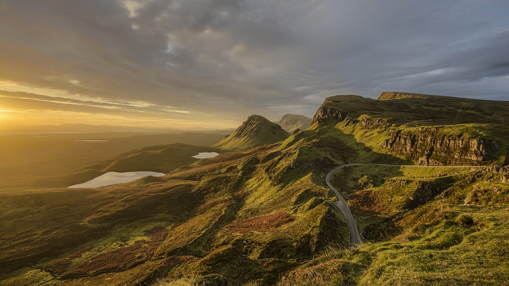 bird's eye photography of winding road on mountain