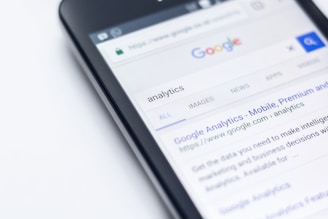 a smart phone showing analytics and search results