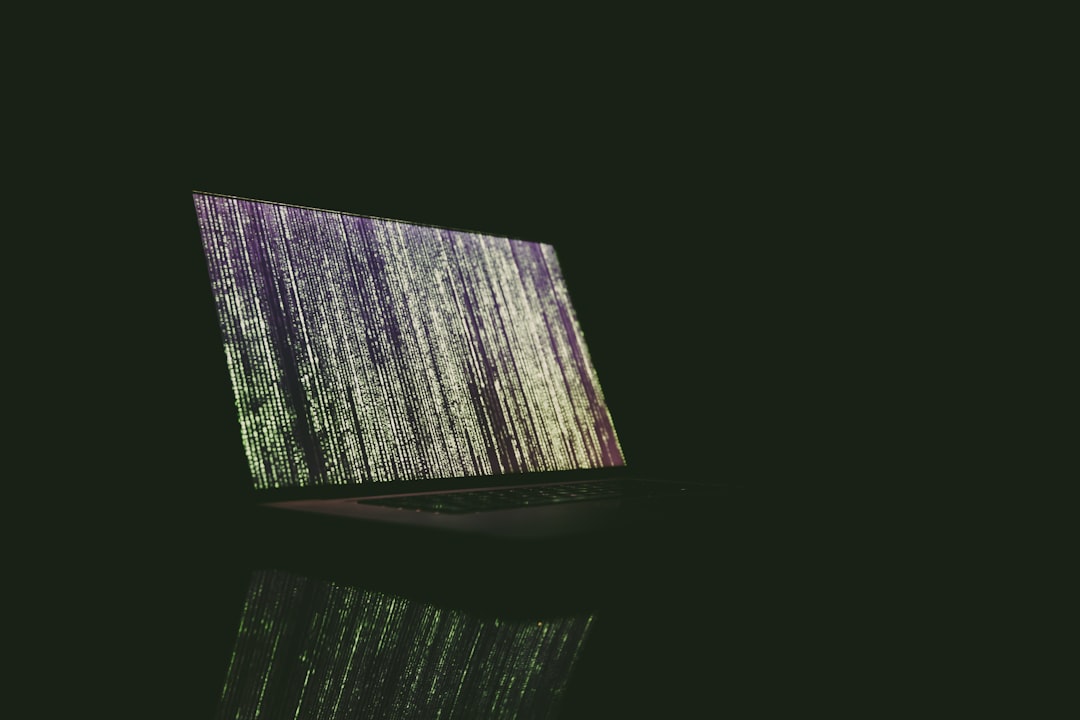 turned on laptop on table,