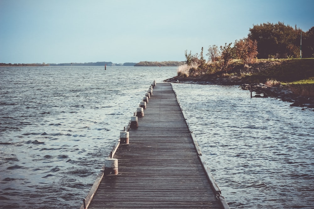 a long wooden dock extending into the water