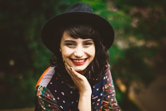 woman with red lipstick smiling
