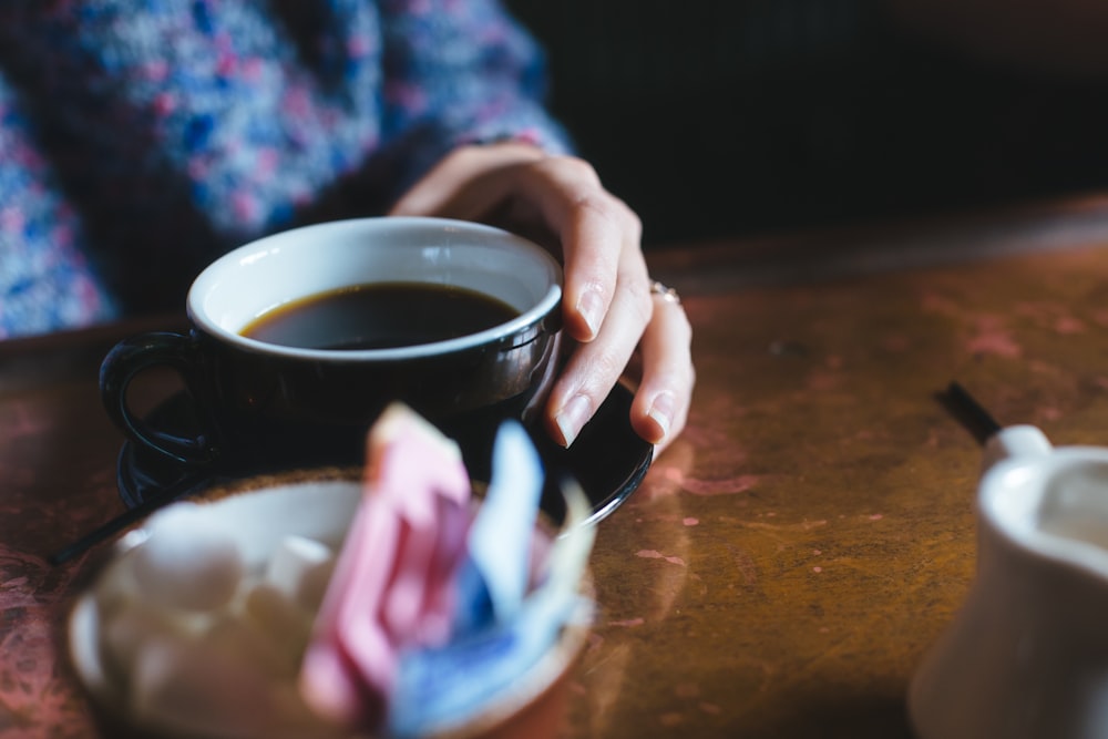 person drinking tea