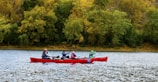 A group of people canoeing on the Rum River.