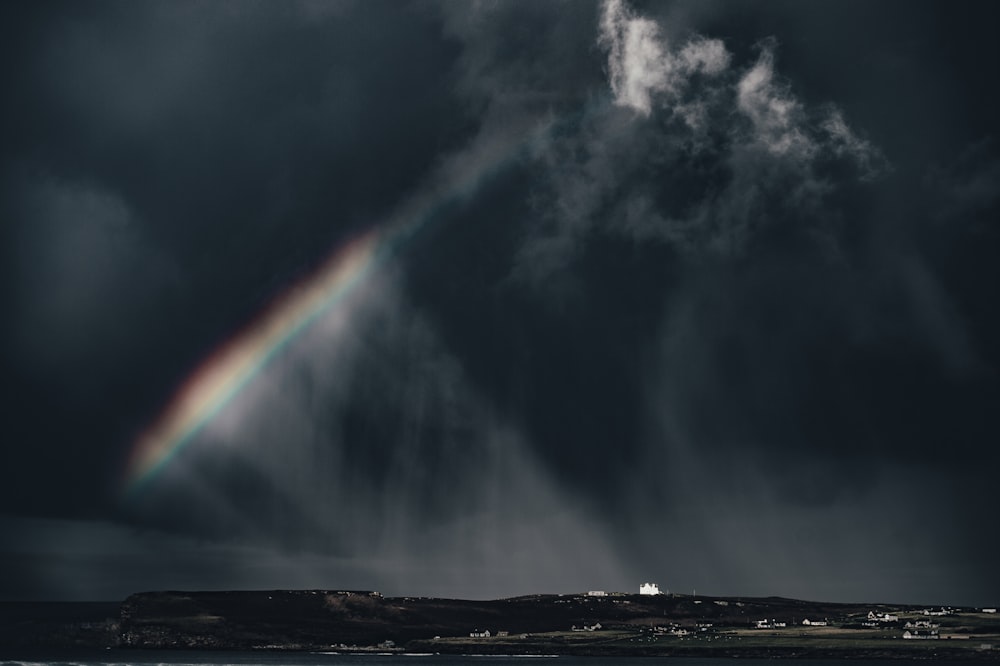 city under dark clouds