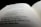 A close-up view of an open book with printed text. The focus is on the poem titled 'The Little Boy Lost', with the rest of the page appearing slightly blurred. The lighting creates a soft and thoughtful ambiance.