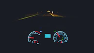 Nighttime driving lesson showing illuminated dashboard and cautious driving