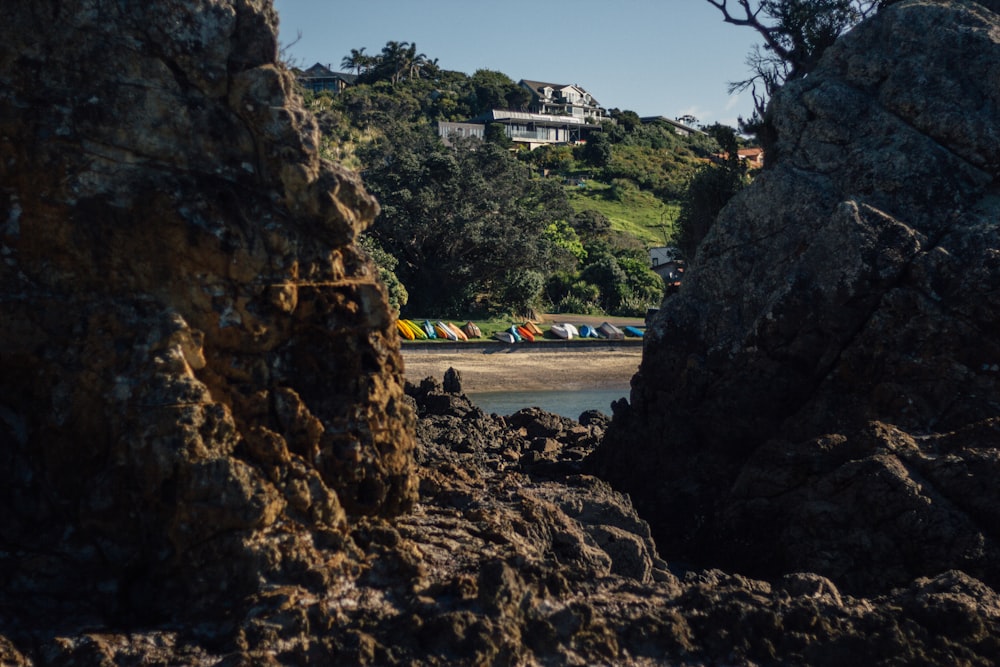 rock formation on shore near hill