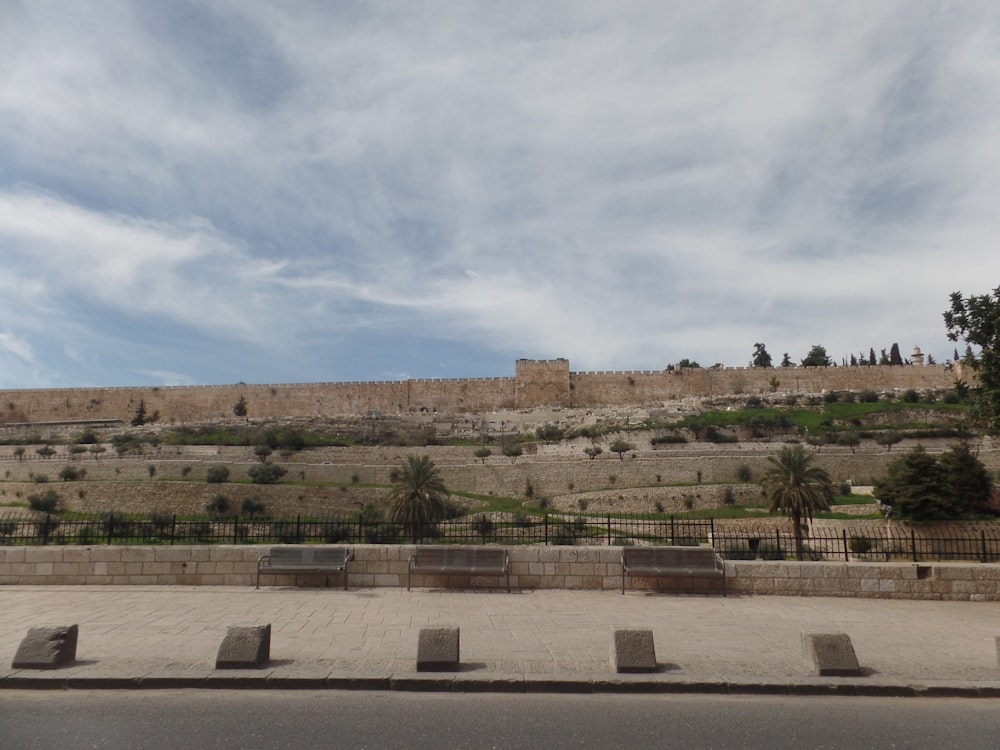 Benches against a wall in Israel.