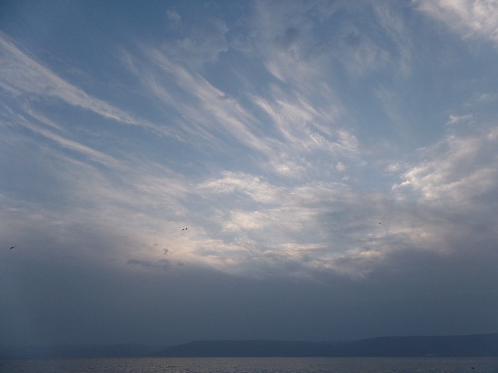 A blue cloudy sky.