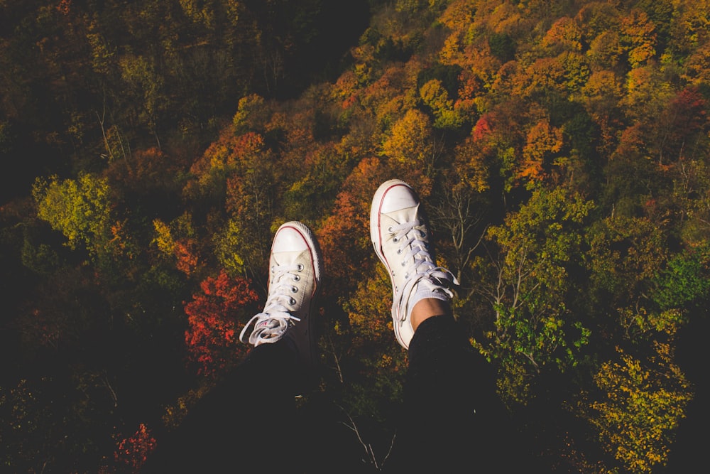 pair of white low-top sneakers