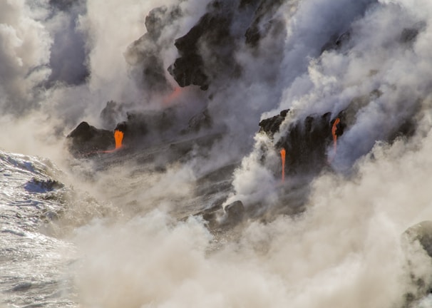 photography of volcanic eruption during daytime