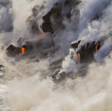 photography of volcanic eruption during daytime