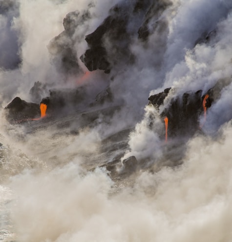 photography of volcanic eruption during daytime