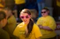 smiling girl wearing pink framed sunglasses