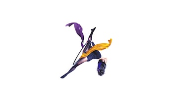 A person performs an acrobatic pose suspended in mid-air with a hoop. They are wearing a dark outfit with patterns or textures and have long dark hair. Flowing, colorful ribbons of purple and yellow accompany the motion of the pose, creating a dynamic and artistic effect.