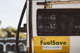 automotive fuel pump reading at 242 pesos