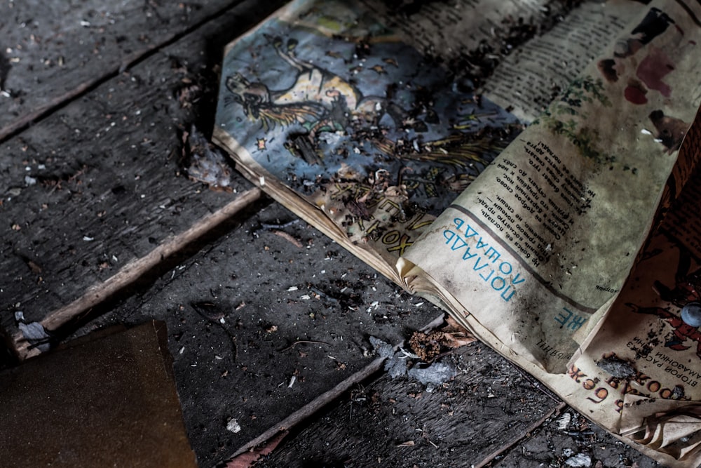 opened storybook on brown wooden surface