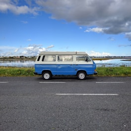 A medium-sized blue van ready for a weekend trip.