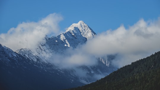 snow covered mountain under blue sky in Leutasch Austria