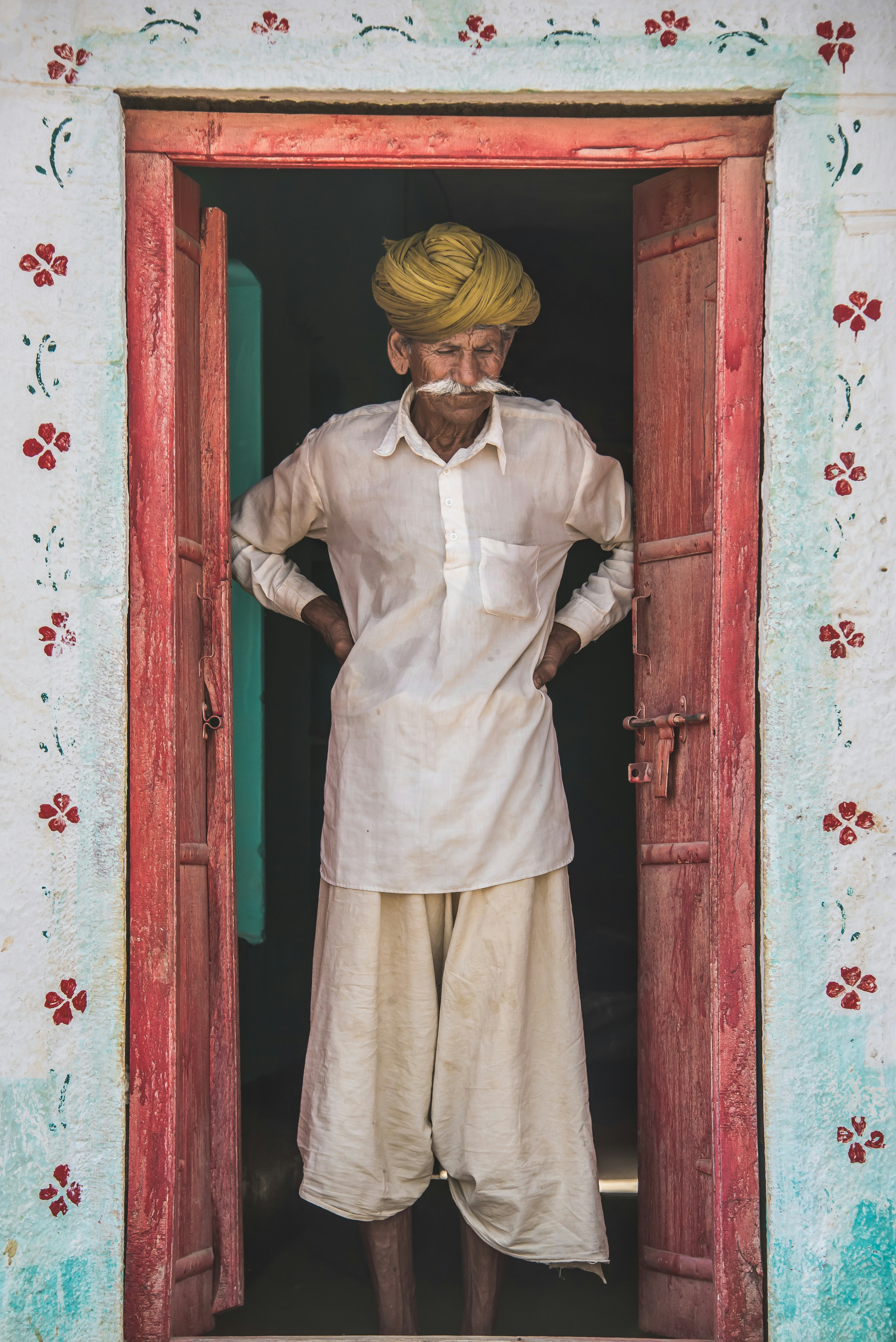 Indian man standing in doorway