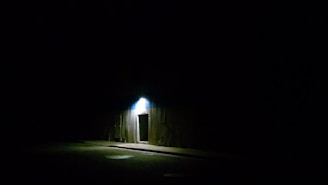 A cinematic scene showcasing a dark, immersive atmosphere.