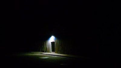 A cinematic scene showcasing a dark, immersive atmosphere.