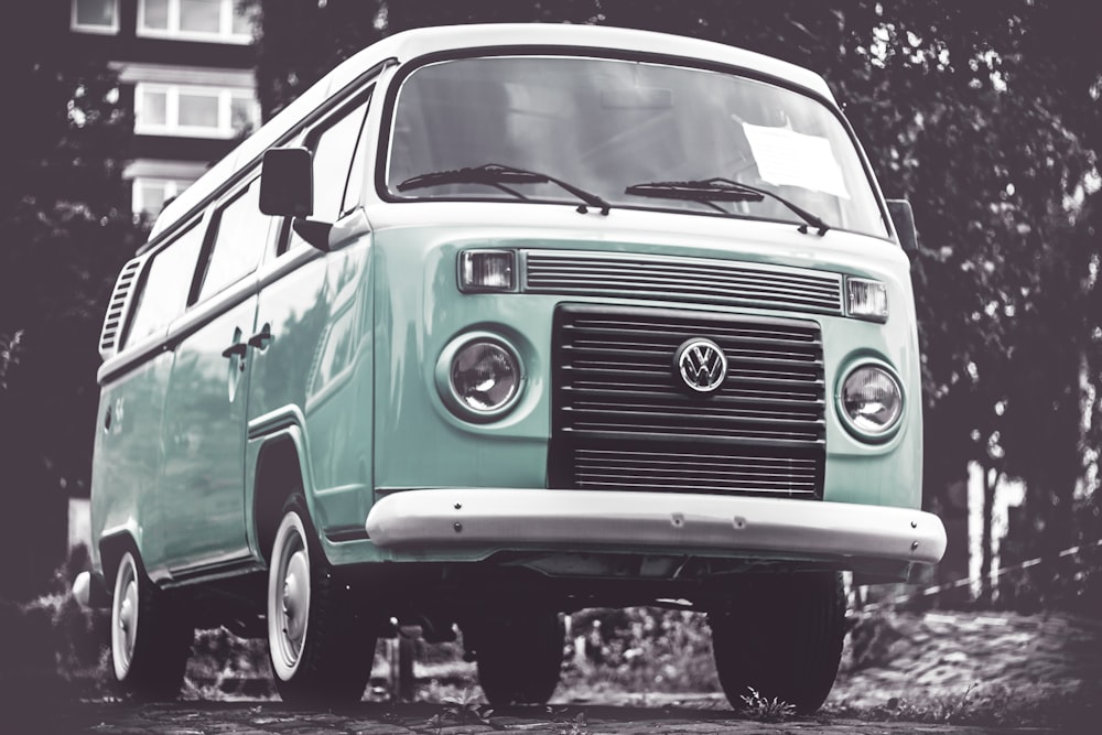 selective color photography of teal Volkswagen T1 van