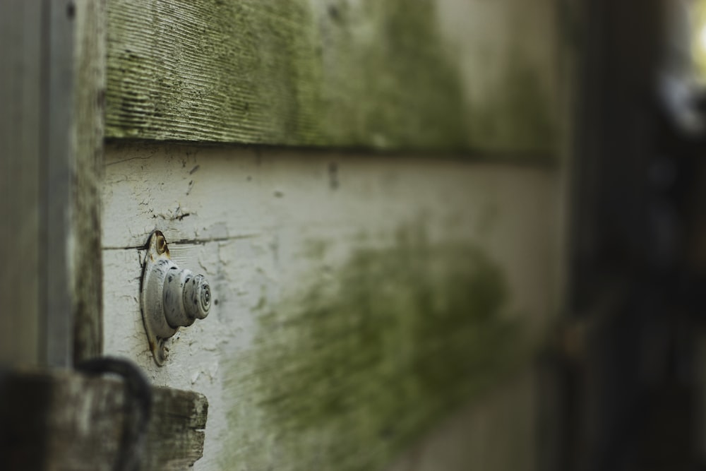 selective focus photo of white wooden top