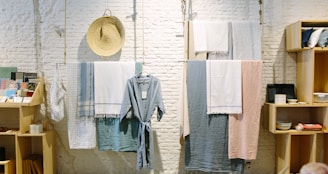 assorted-color towels hanging inside room