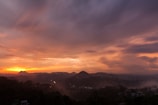 Sunset view over Machu Picchu with vibrant orange and purple skies