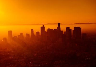 silhouette photo of city skyline orange google meet background