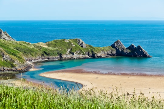 island surround by blue ocean water in Wales United Kingdom