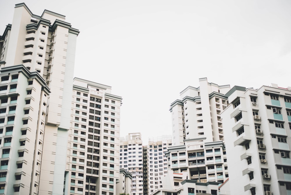 cluster of white concrete buildings