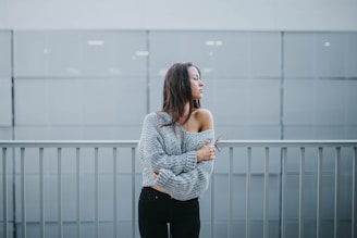 woman in gray sweater