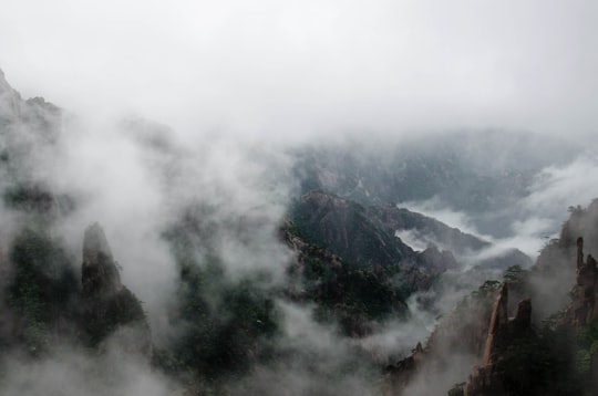 mountains covered with fog in Huangshan China