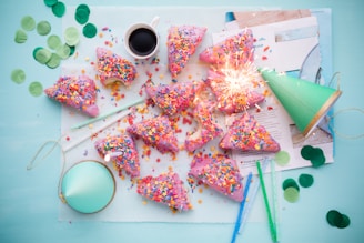 green paper cone near slice cakes