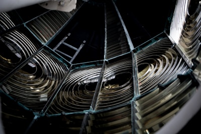 Close-up of a classic Fresnel lens with intricate glass details