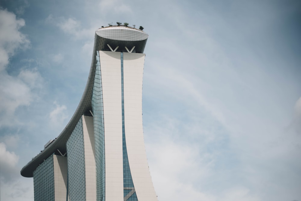 high rise building on Singapore under cloudy sky