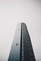 worms eye view photography of gray building
